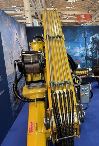 HLM 25/3S fully foldable telescopic marine crane with winch on the Heila Cranes stand at SMM 2026 Hamburg